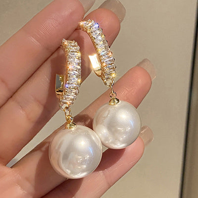 Luxus-Ohrringe mit Perlen und Zirkonen